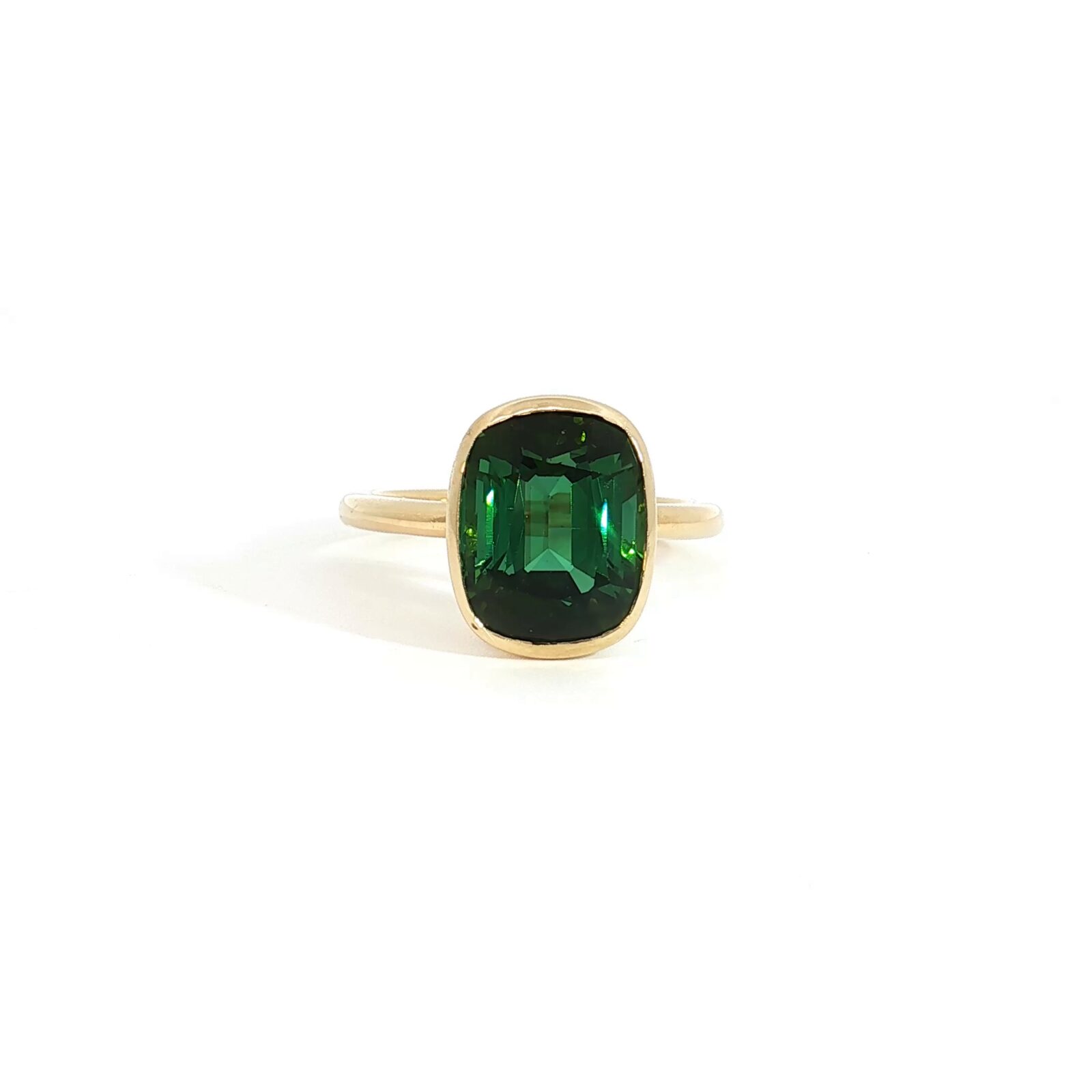 Bezel-Set Cushion Cut Green Tourmaline Solitaire Ring in 18kt Yellow Gold